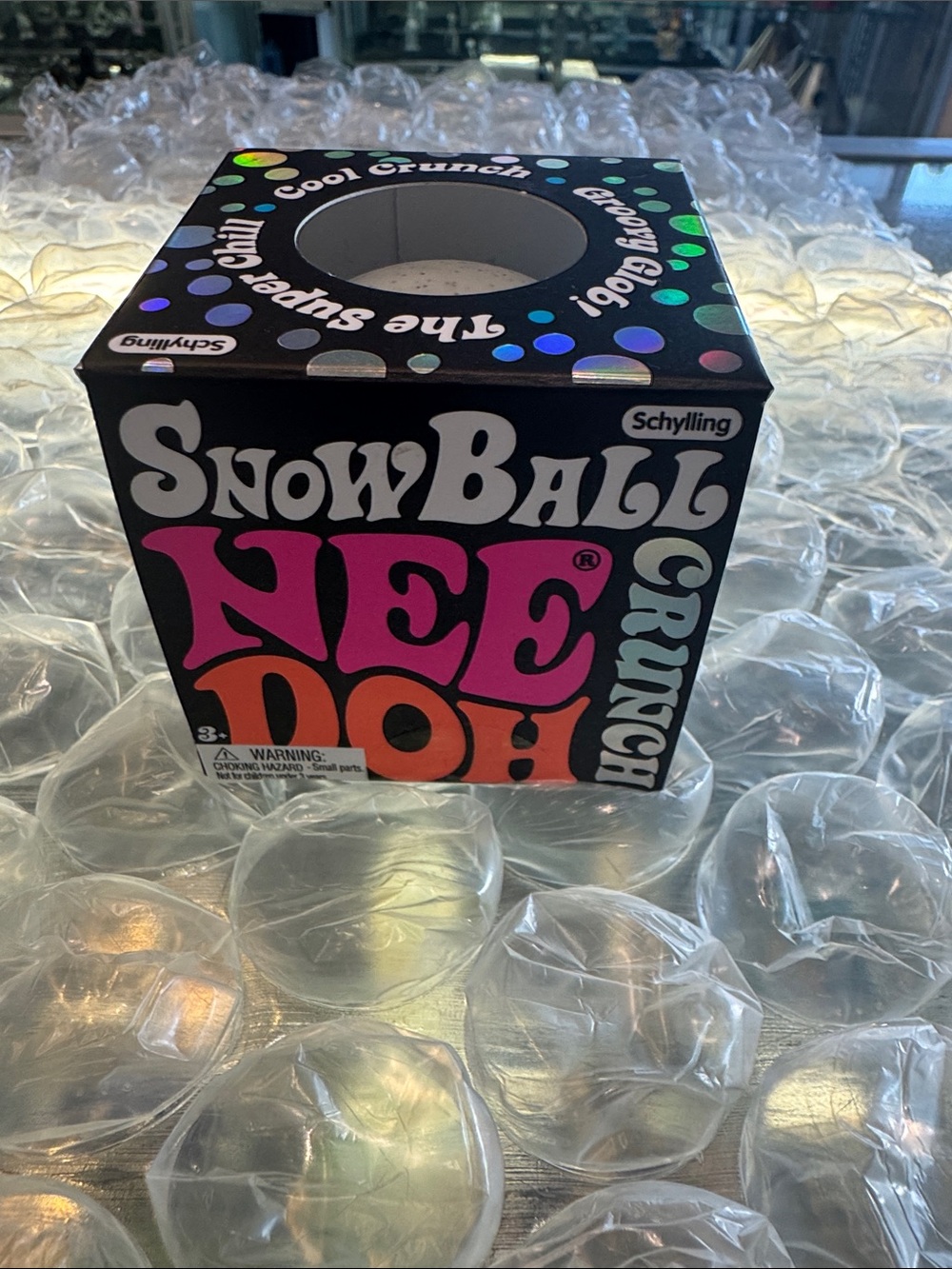 SnowBall NeeDoh Crunch Stress Ball - white with Pink & Orange Accents
